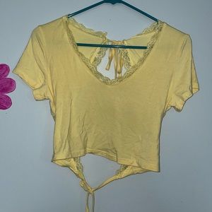 NWOT yellow Open Back tie Tee